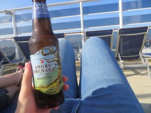 cruising isn't just for old people cider drink alcohol package ncl ultimate beverage package on deck jeans girl