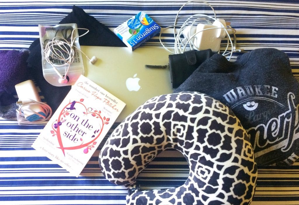 Whats in my hand luggage book headphones plane travel pillow jumper socks macbook travel sickness pills