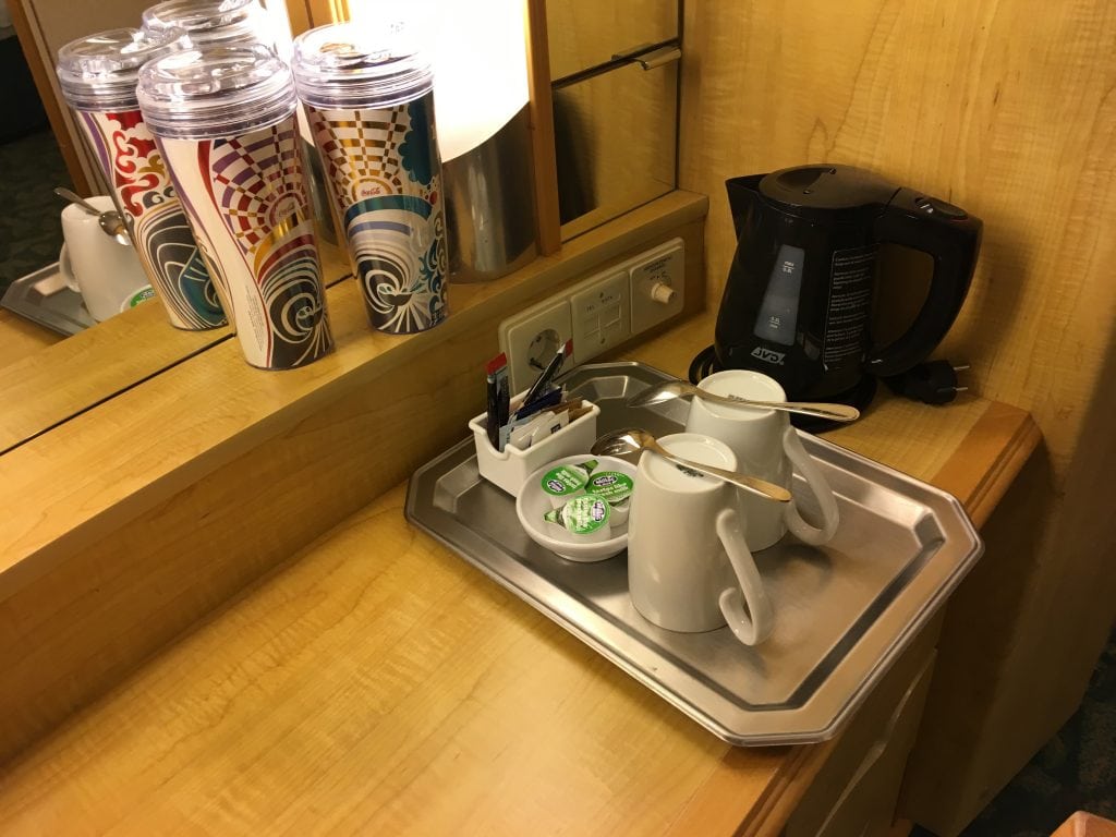independence of the seas inside cabin kettle tea and coffee soda package cups