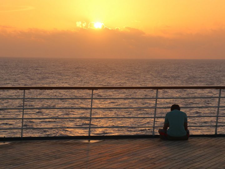 carnival sensation early morning sunrise over deck and ocean sea sitting