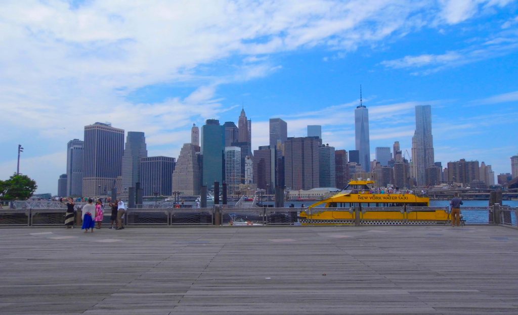 new york city sky line brooklyn bridge water taxi