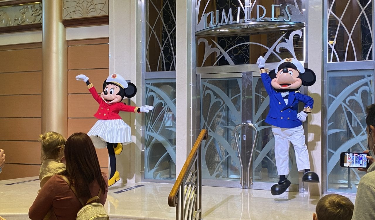 Mickey and Mini welcome guests onboard