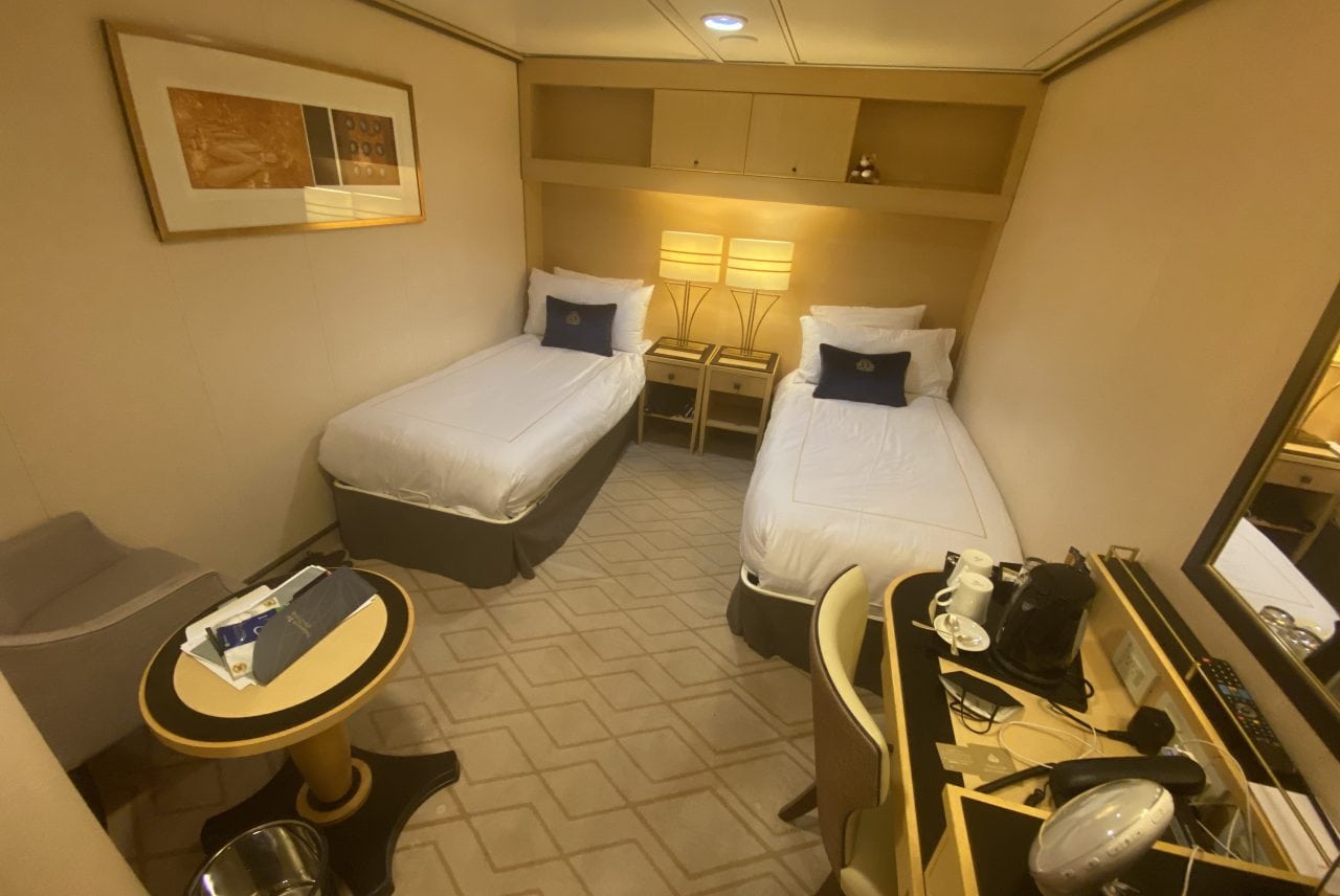 Queen Mary 2 inside cabin with twin beds and kettle