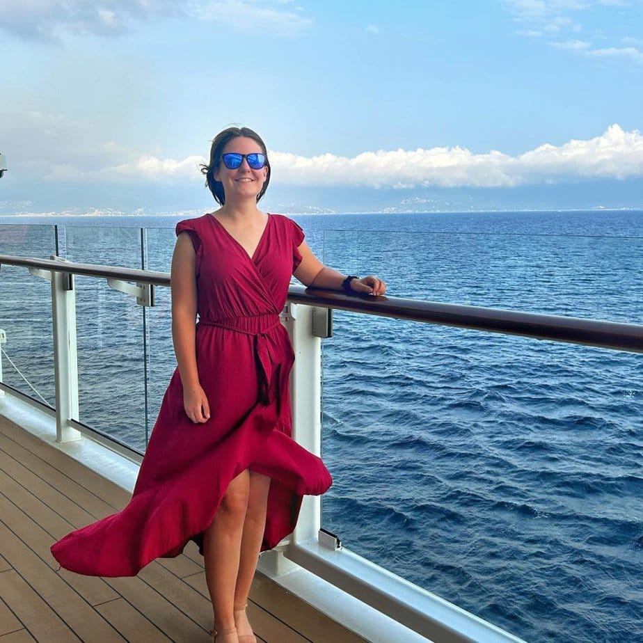 Emma cruises long red dress on Promenade deck