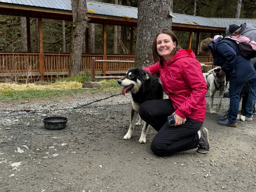 Emma Cruises, Norwegian Encore, Alaska wearing a pac a mac on excursion