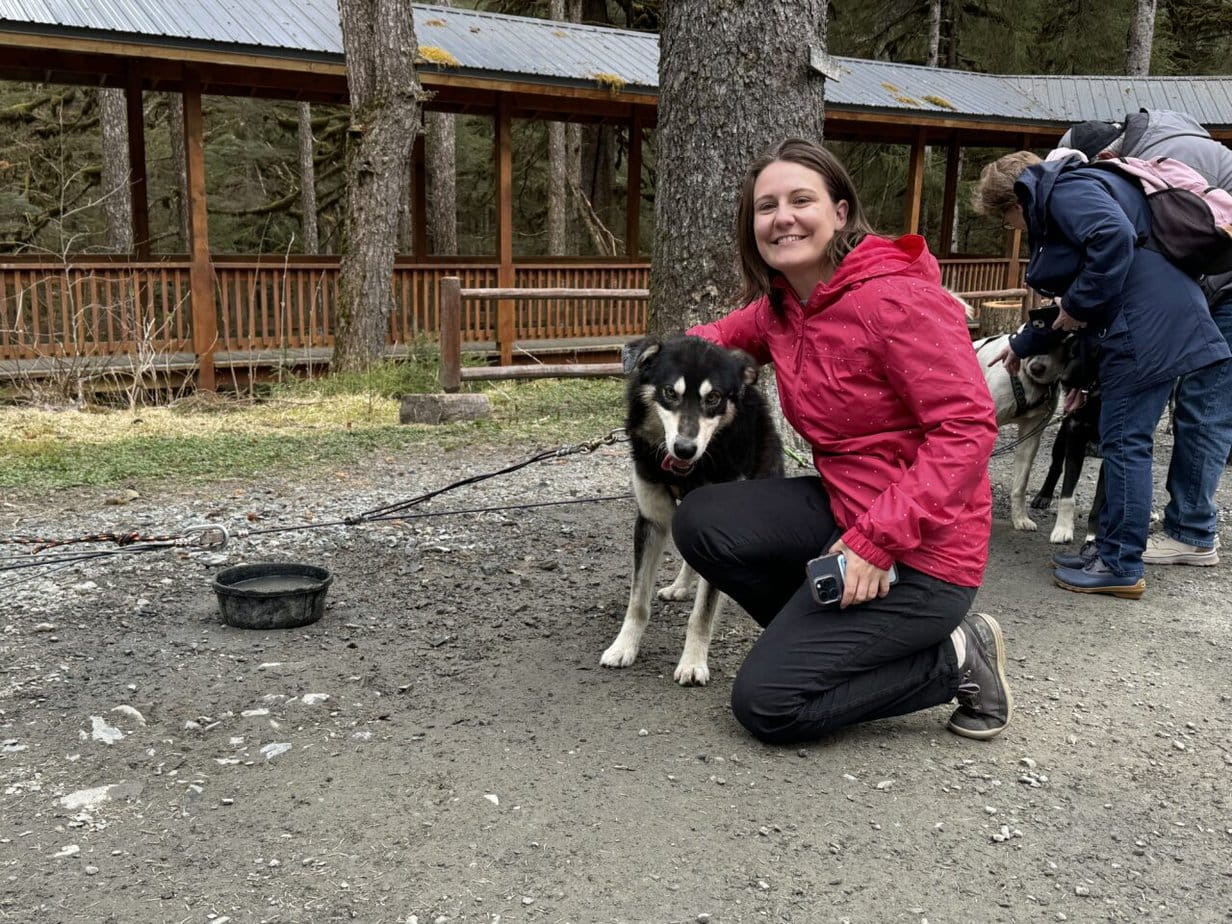 Emma cruises Alaska excursion with Huskies. Norwegian Encore