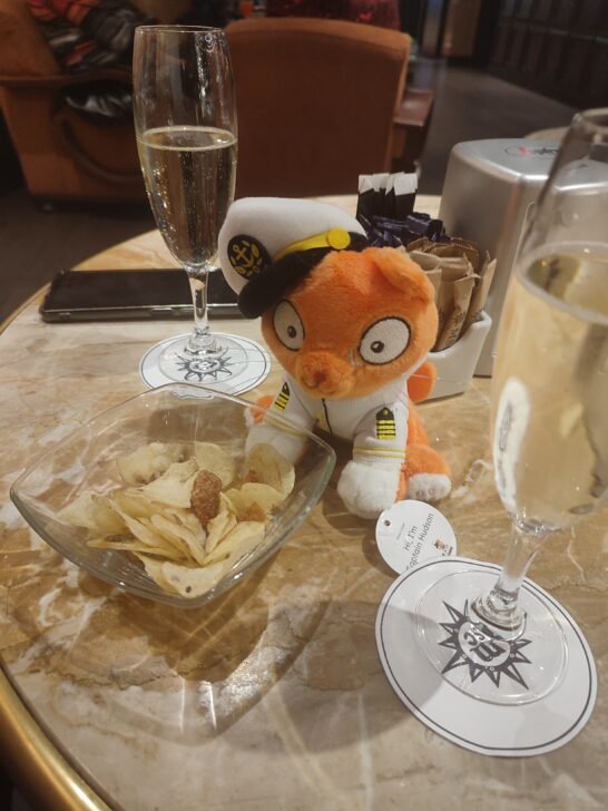 Captain Hudson, champagne and crisps